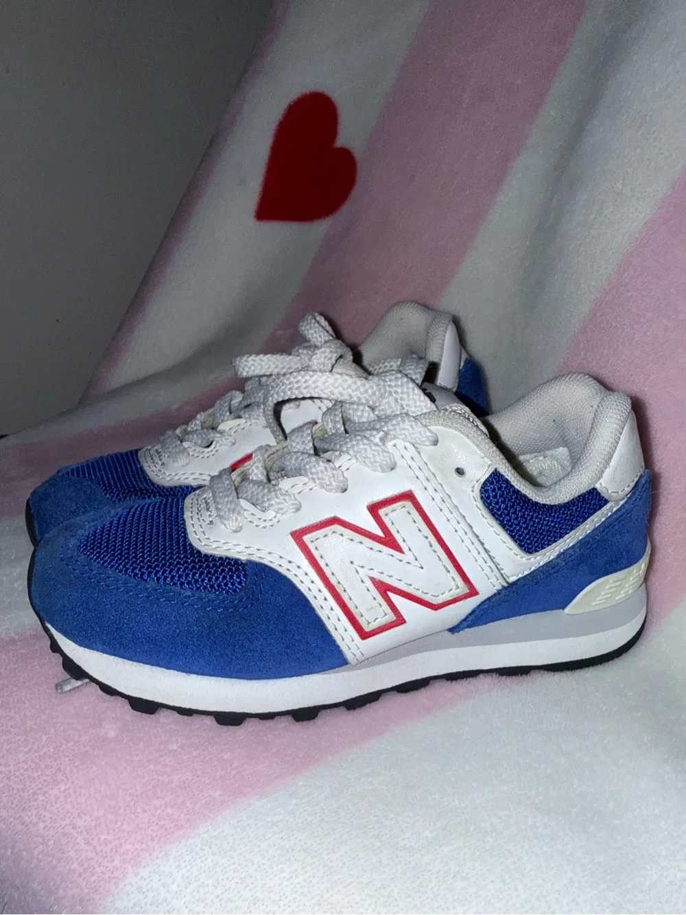 New Balance 574 Kids Sneakers in Blue and White with Pink Accents, Size 11C